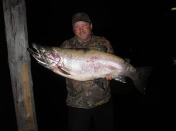 Steve Valentine holding a gigantic gerrard trout